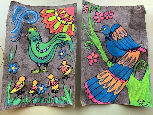 Two colorful bird paintings made by students